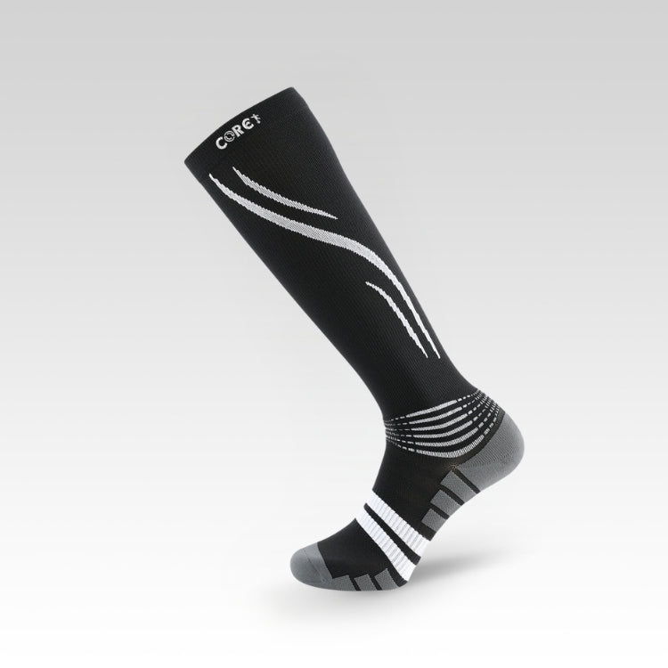 Black and gray compression sock with white accents on a light gray background