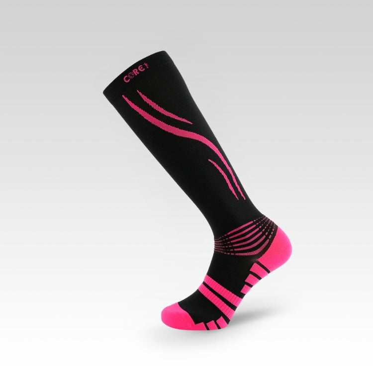 Black and pink compression sock on a light gray background